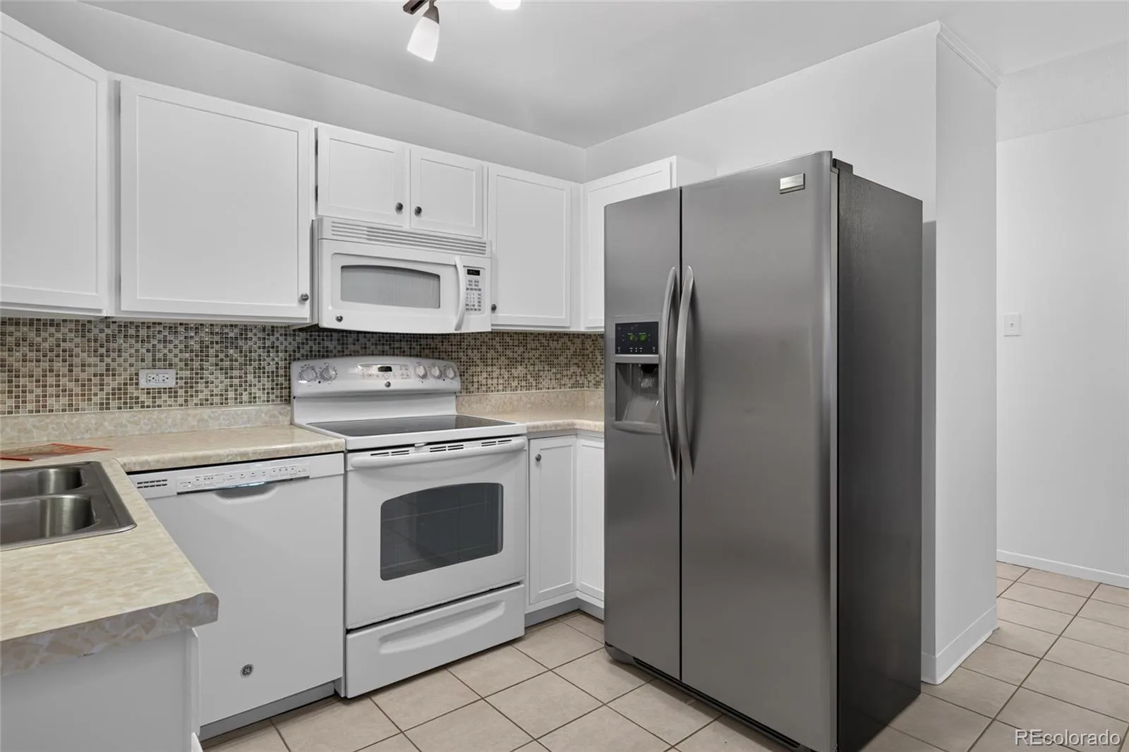 9300 E Center Avenue #1B Denver CO 80247 | MLS #REC7043036 07012026225944 1600 5