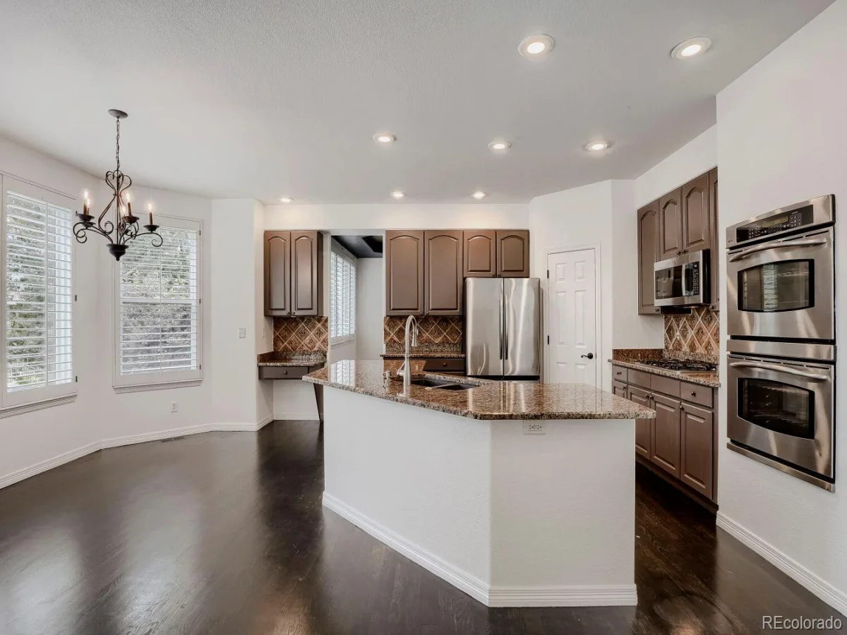 6969 S Rome Street Aurora CO 80016 | MLS #REC7116155 07292026182441 1200 12