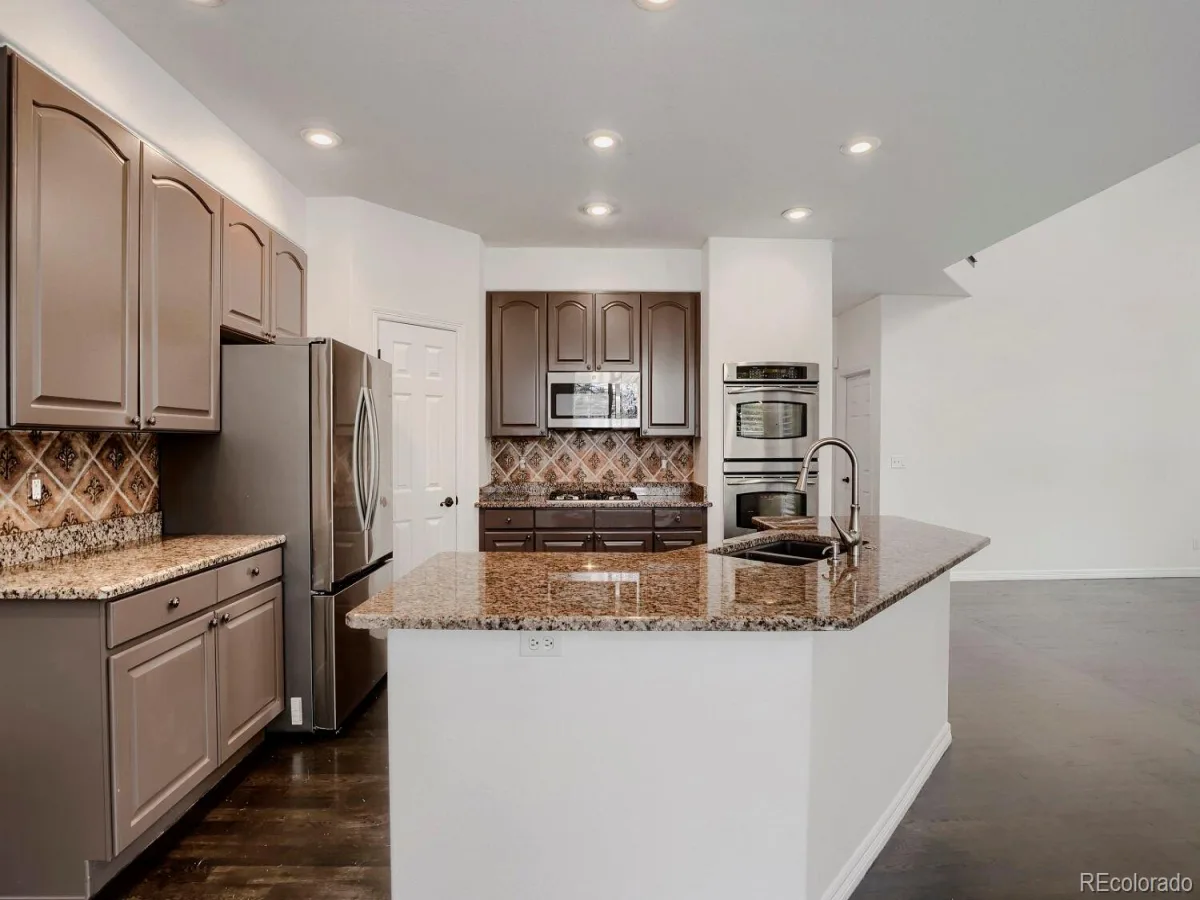 6969 S Rome Street Aurora CO 80016 | MLS #REC7116155 07292026182441 1200 15