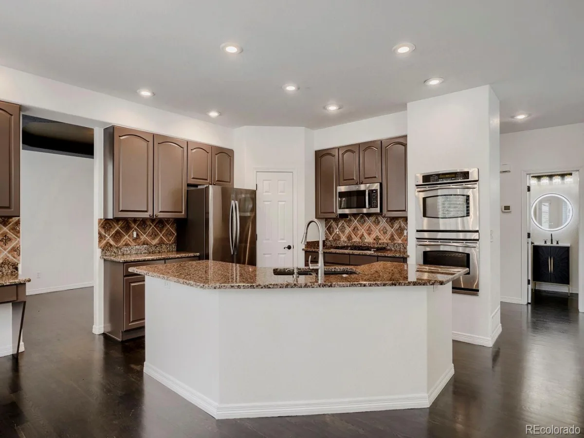 6969 S Rome Street Aurora CO 80016 | MLS #REC7116155 07292026182441 1200 16