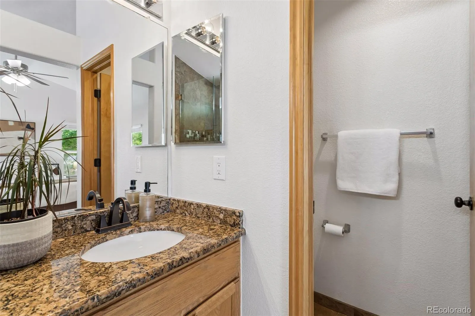 1355 S Alton Court Denver CO 80247 MLS #REC7134467 05142026075417 1600 25