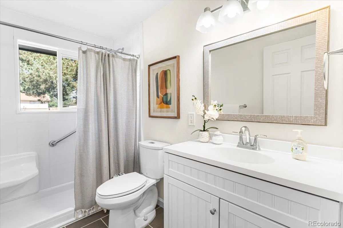 6764 Newland Street Arvada CO 80003 | MLS #REC7217485 08102026174623 1200 17