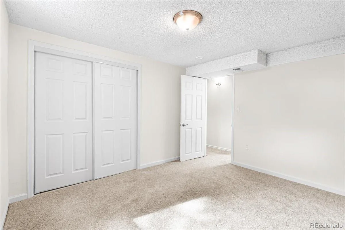 6764 Newland Street Arvada CO 80003 | MLS #REC7217485 08102026174623 1200 22