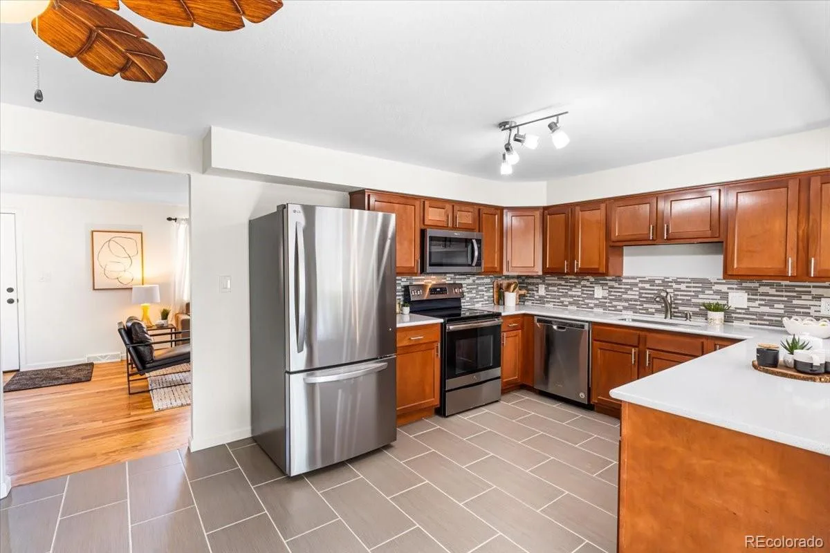 6764 Newland Street Arvada CO 80003 | MLS #REC7217485 08102026174623 1200 6