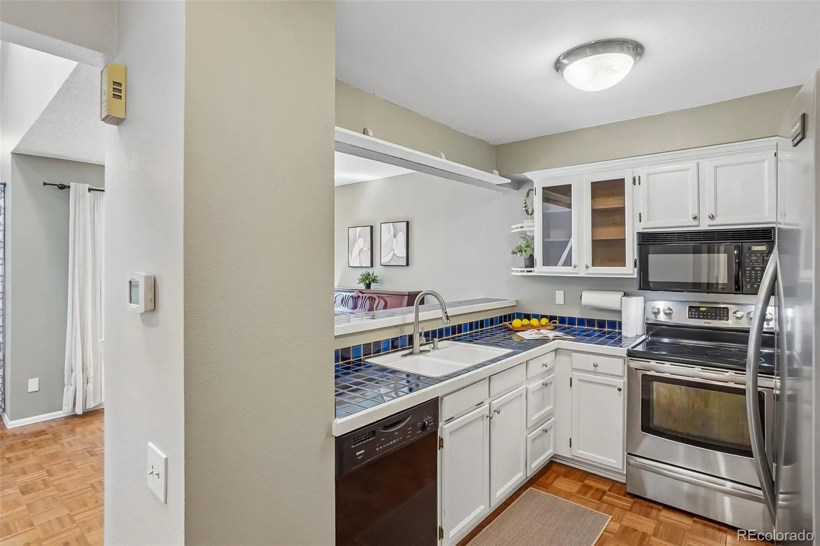 9950 Grove Street #E Westminster CO 80031 | MLS #REC7244345 08172026230747 1600 12