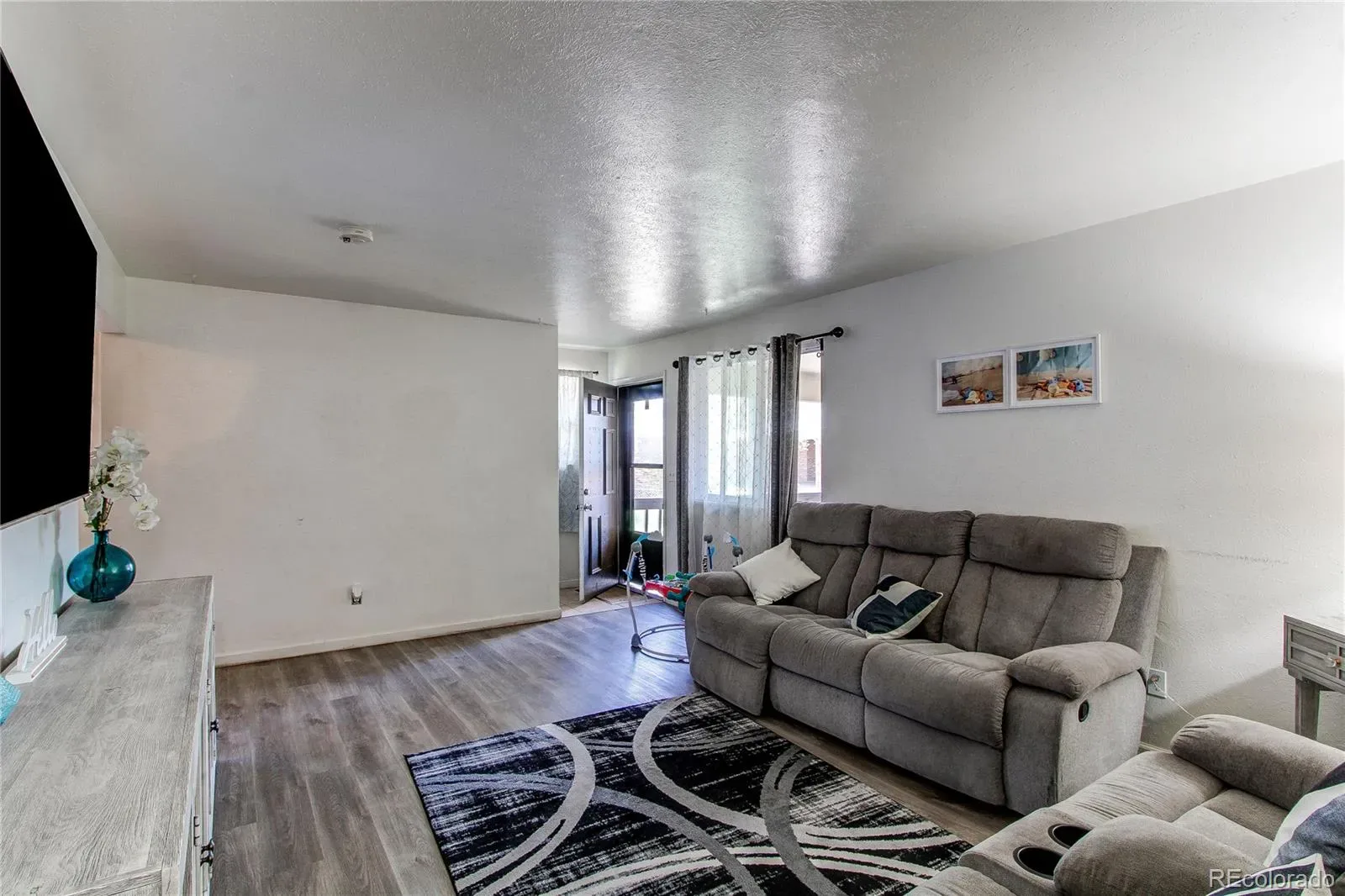 14220 E 22nd Place Aurora CO 80011 | MLS #REC7379076 03312026002532 1600 3