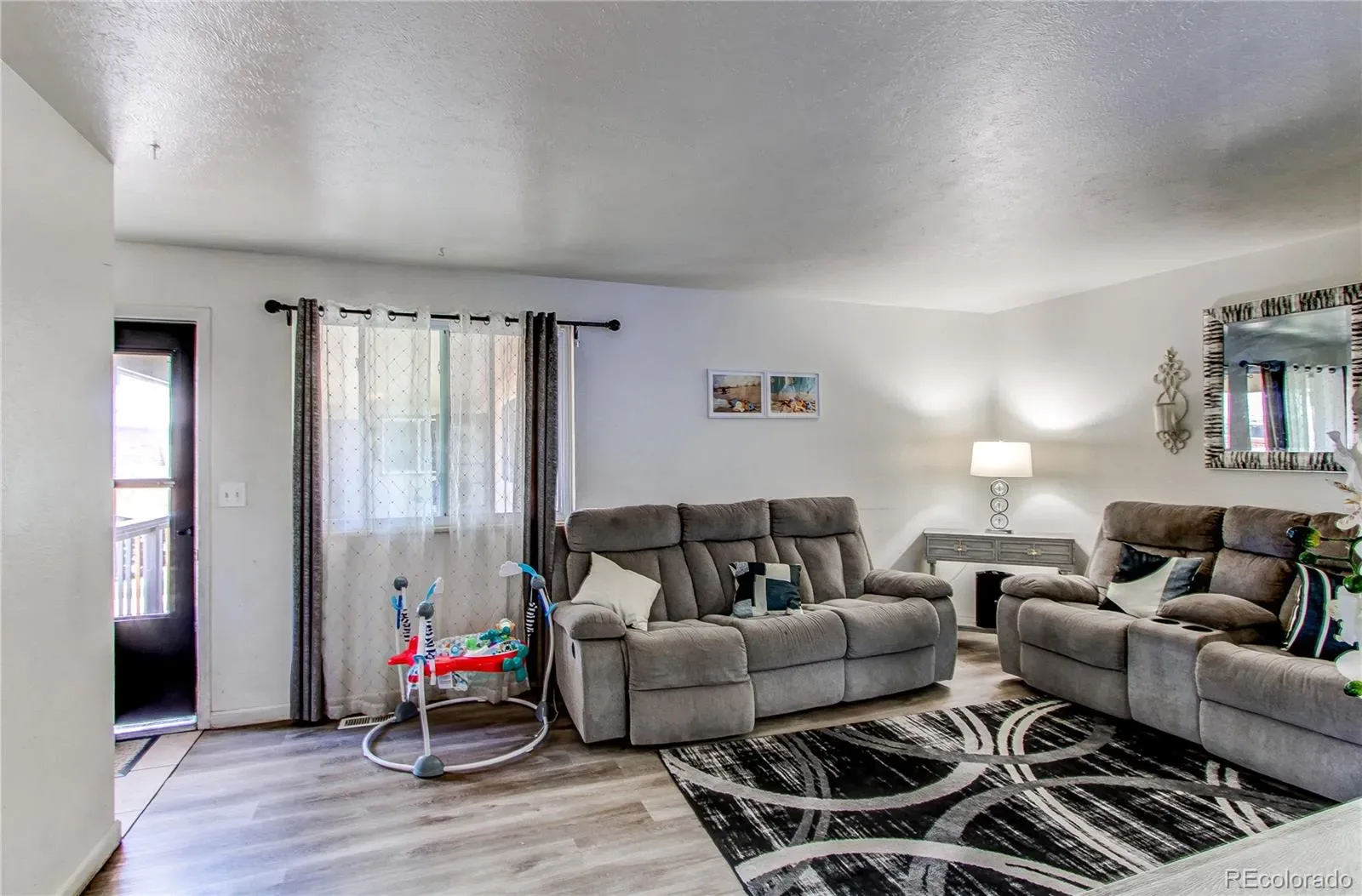14220 E 22nd Place Aurora CO 80011 | MLS #REC7379076 03312026002532 1600 4