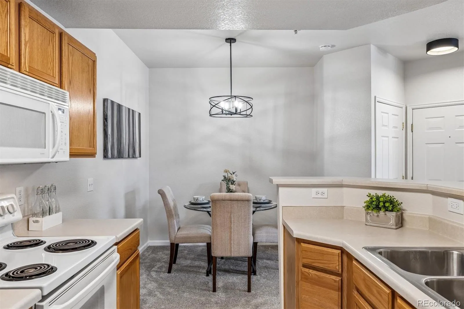 7440 S Blackhawk Street #104 #2 Englewood CO 80112 | MLS #REC7385901 07102026181417 1600 7