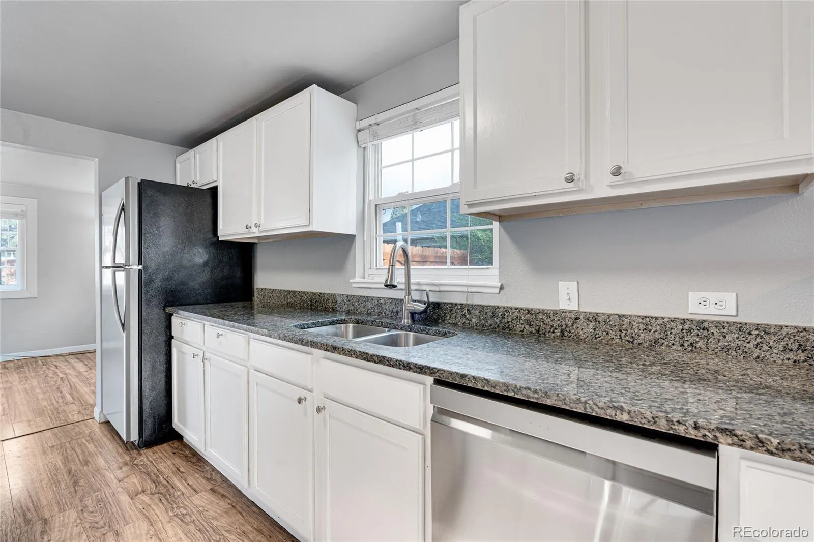 1301 S Wolff Street Denver CO 80219 MLS #REC7398989 04282026172433 1600 15