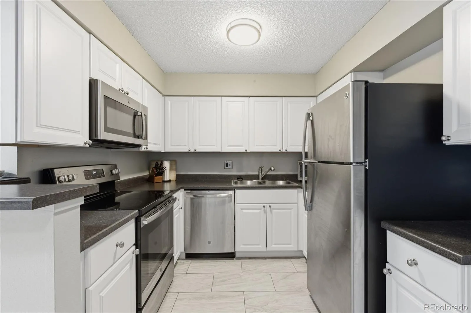 12005 E Harvard Avenue #208 Aurora CO 80014 MLS #REC7431059 06102026205041 1600 15