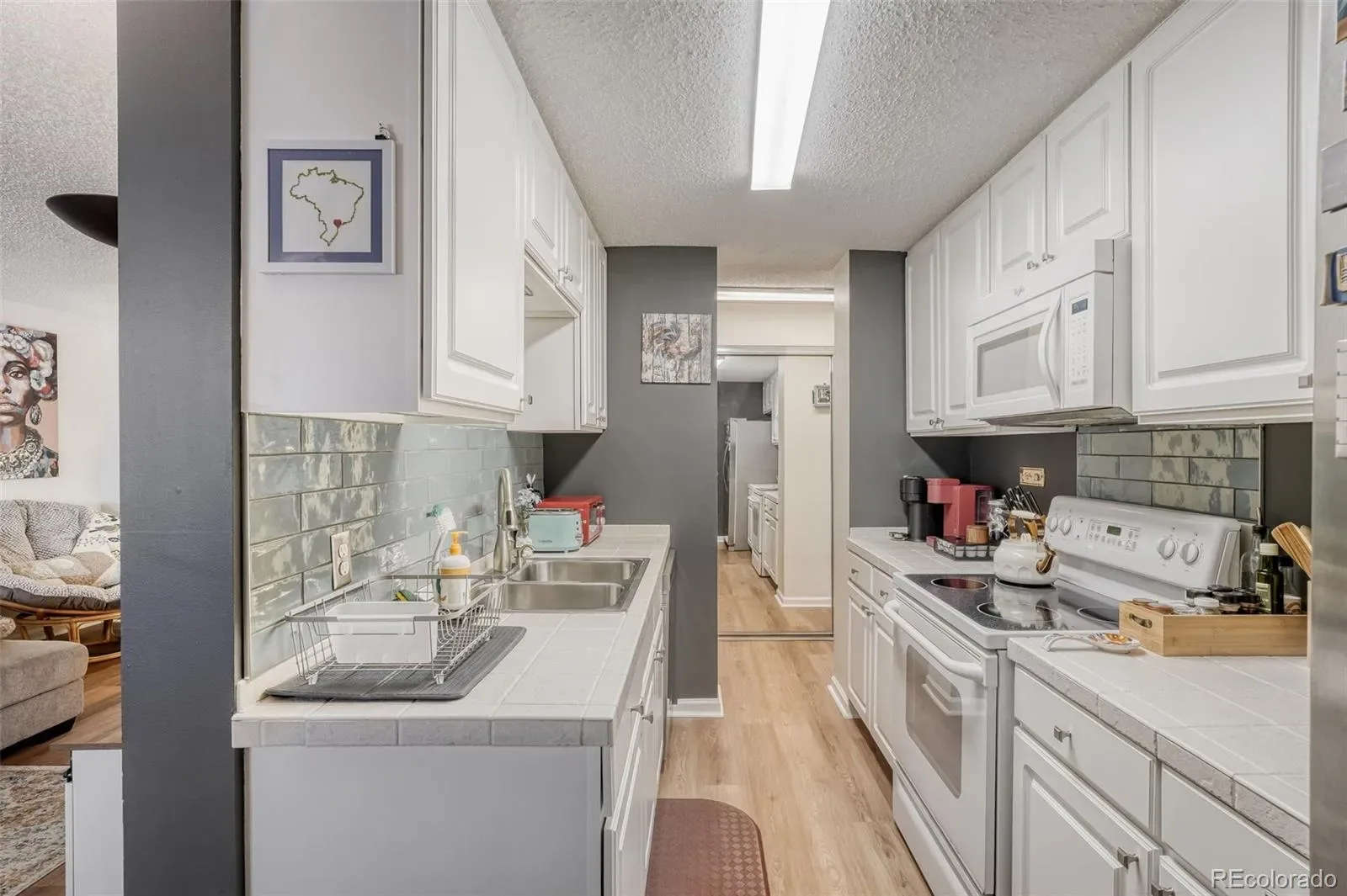 2225 Buchtel Boulevard #305 Denver CO 80210 MLS #REC7517441 03212026192936 1600 11