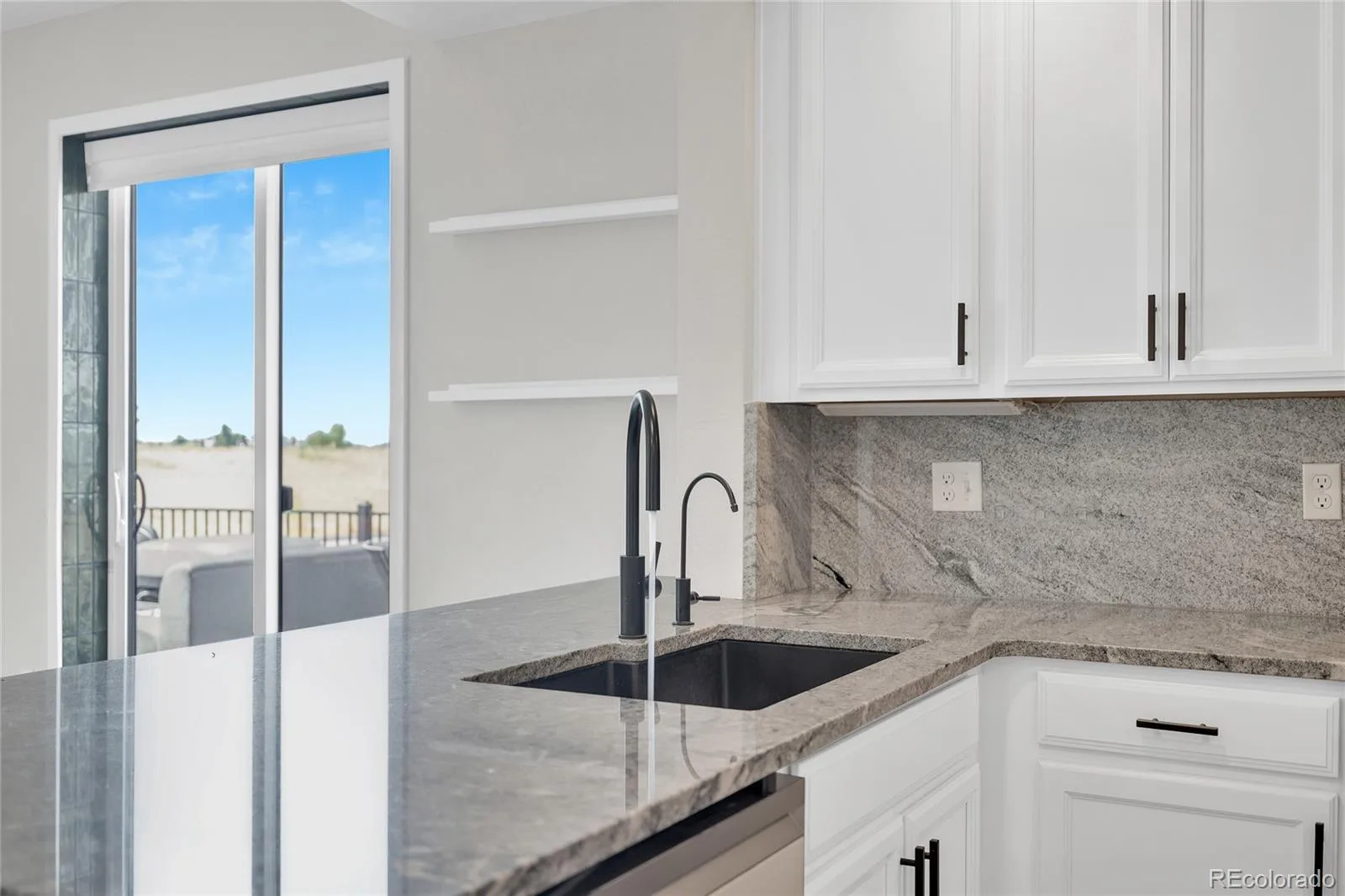 9811 E 56th Place Denver CO 80238 | MLS #REC7612113 08102026155125 1600 27
