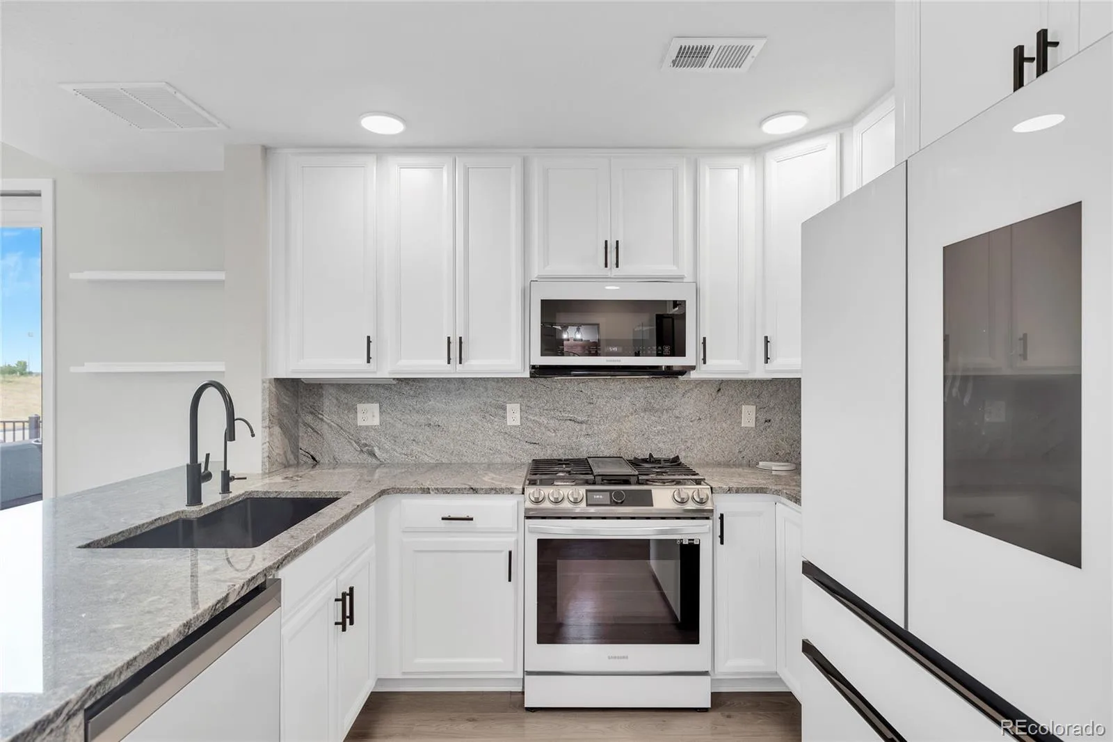 9811 E 56th Place Denver CO 80238 | MLS #REC7612113 08102026155125 1600 28