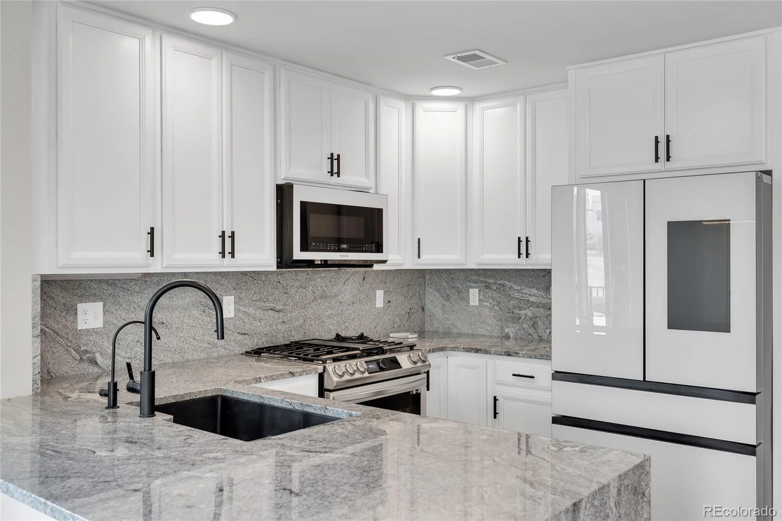 9811 E 56th Place Denver CO 80238 | MLS #REC7612113 08102026155125 1600 30