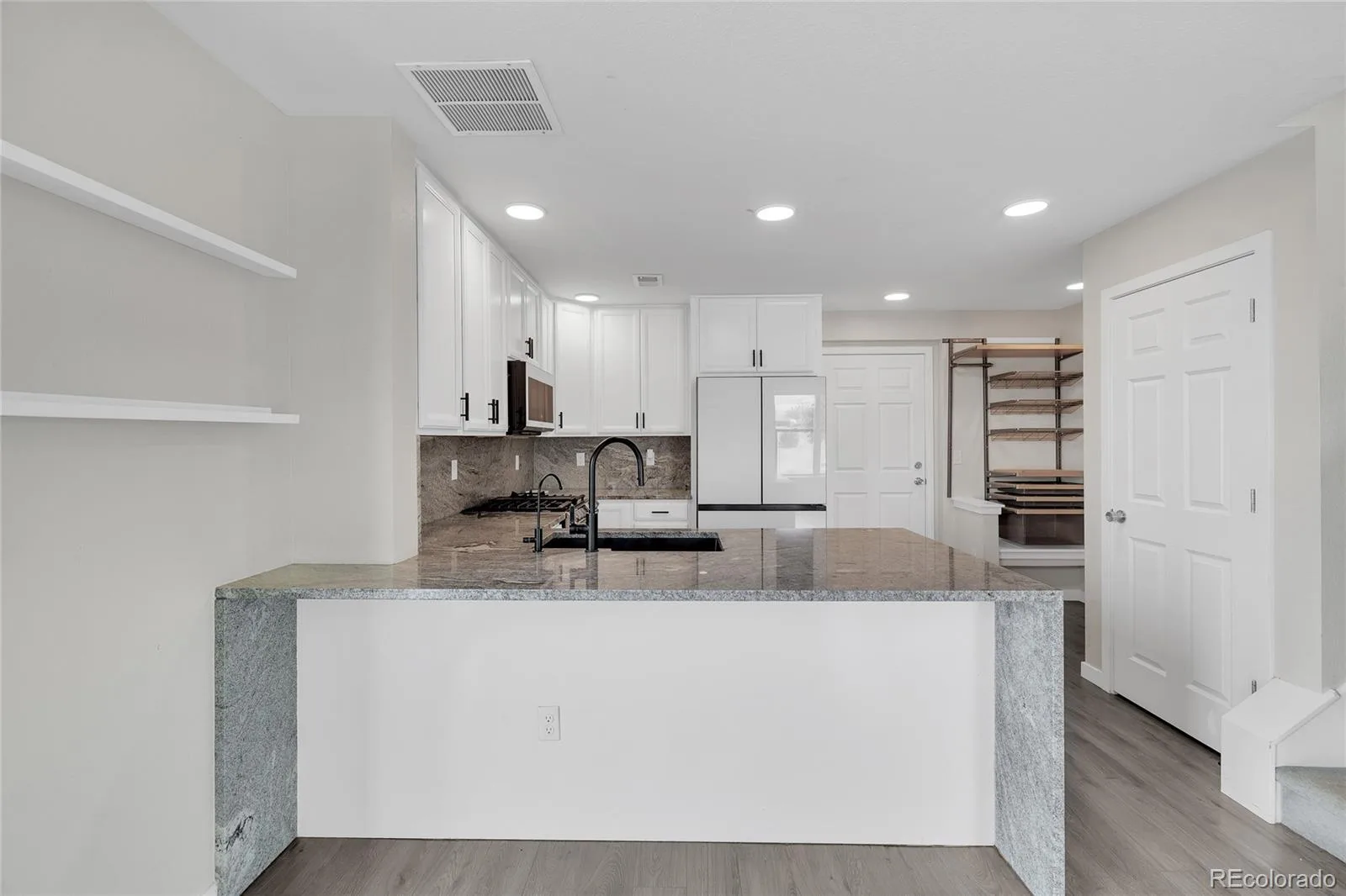 9811 E 56th Place Denver CO 80238 | MLS #REC7612113 08102026155125 1600 9