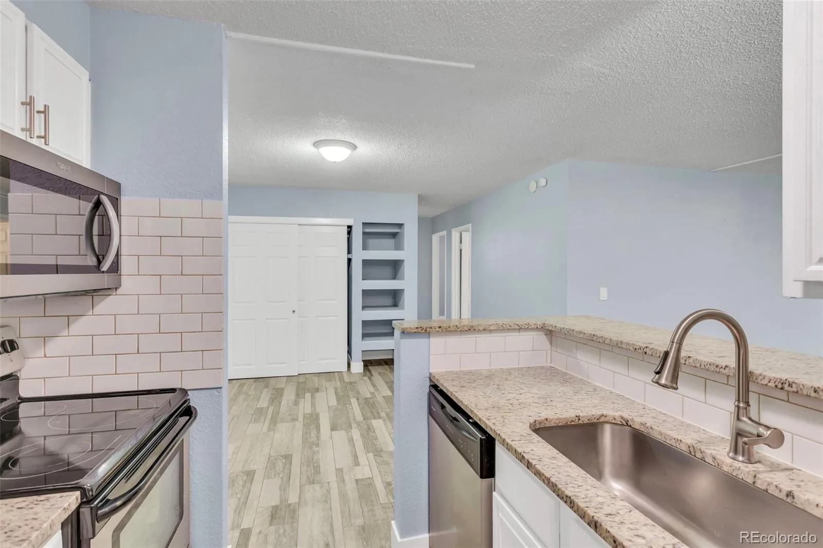 2281 S Vaughn Way #104A Aurora CO 80014 | MLS #REC7694955 08132026070517 1600 8