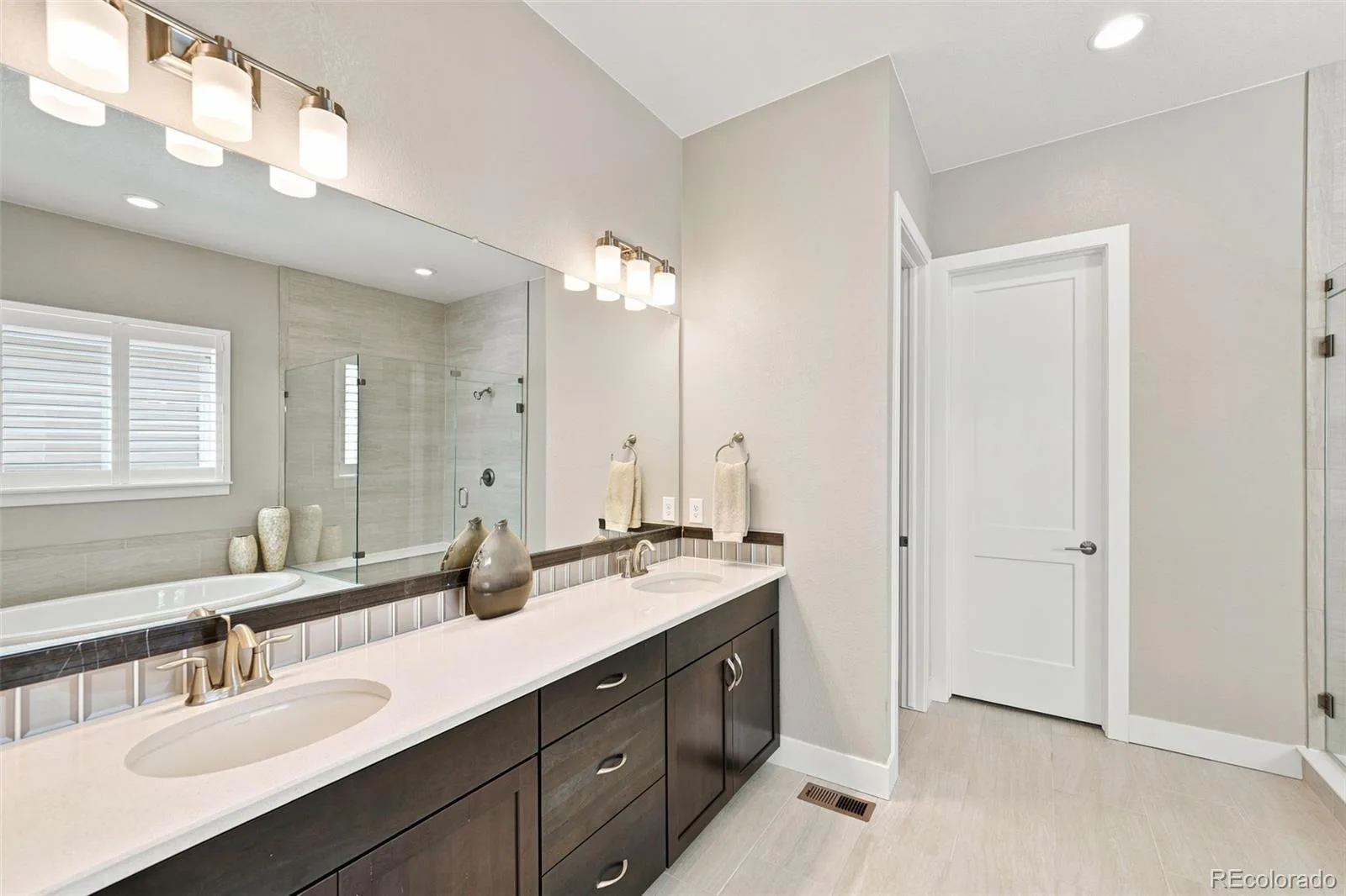 8263 Estes Park Avenue Littleton CO 80125 | MLS #REC7742490 08072026203255 1600 12