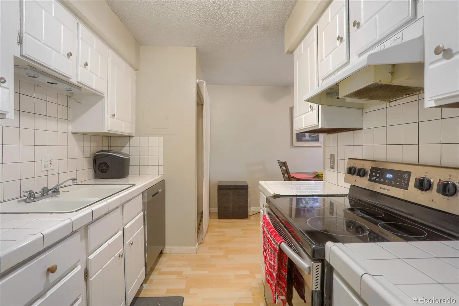 4645 S Lowell Boulevard #F Denver CO 80236 | MLS #REC7774334 08132026164126 1600 8