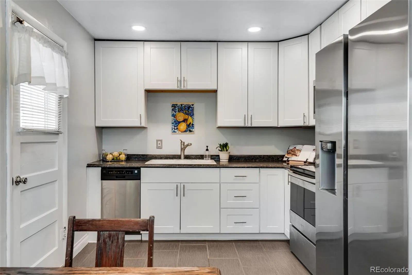 1295 S Wolff Street Denver CO 80219 MLS #REC7797680 04232026033613 1600 11