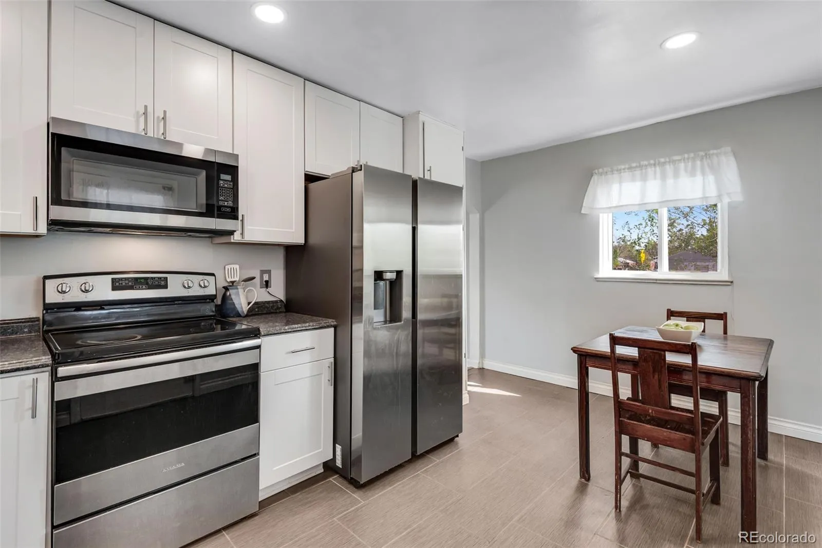 1295 S Wolff Street Denver CO 80219 MLS #REC7797680 04232026033613 1600 14