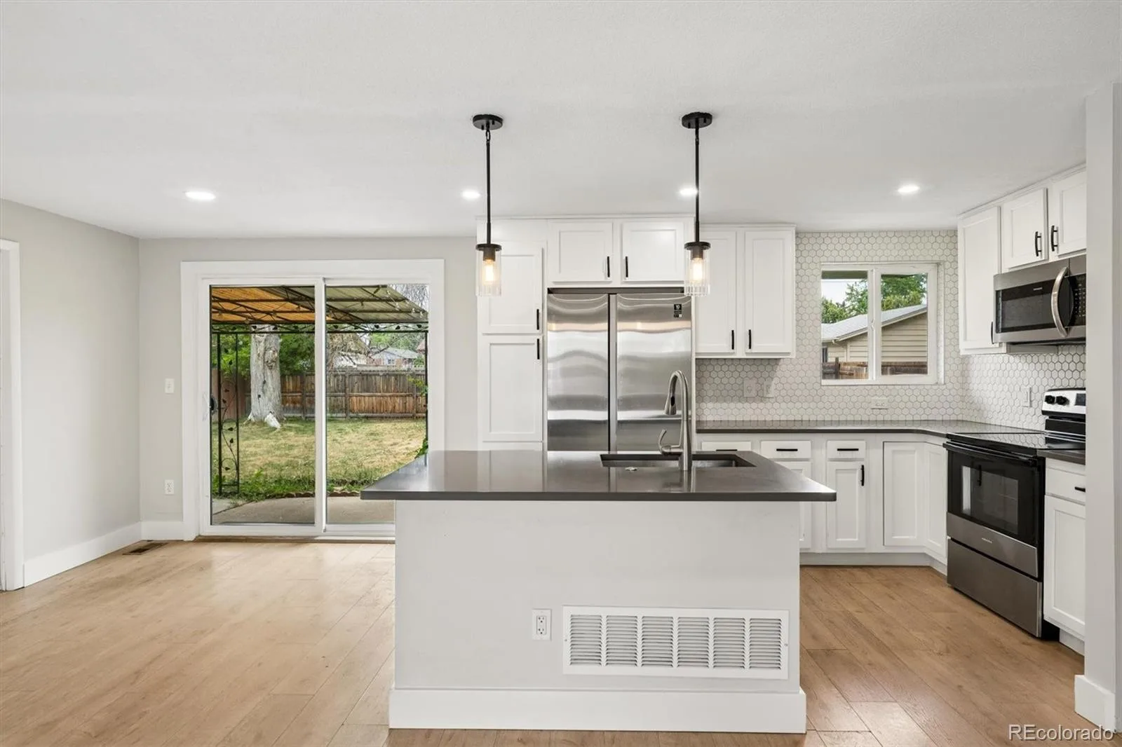 8419 Ames Street Arvada CO 80003 MLS #REC7847992 06232026033710 1600 10