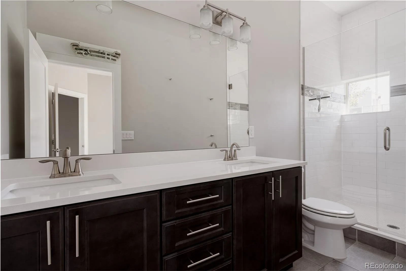 2403 Eliot Street Denver CO 80211 | MLS #REC7925826 08282026175724 1600 26