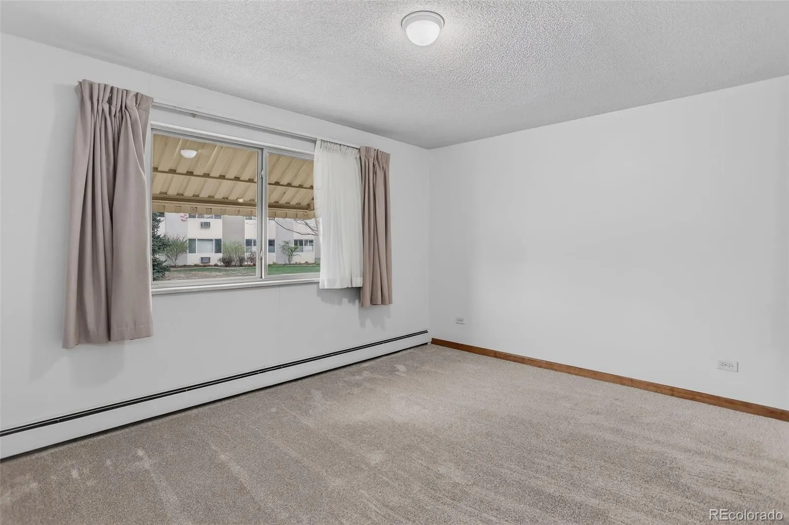 9150 E Center Avenue #12A Denver CO 80247 MLS #REC7947441 04102026203732 1600 25