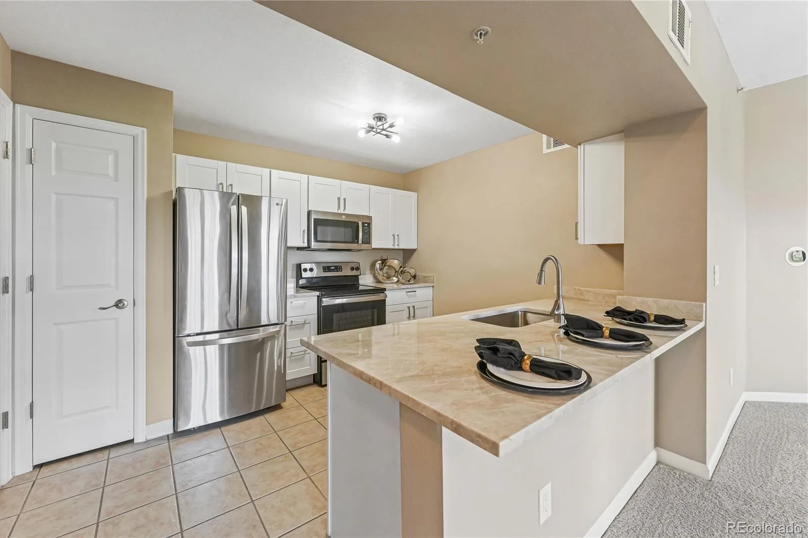 12824 Ironstone Way #302 Parker CO 80134 | MLS #REC7952173 08122026071551 1600 2