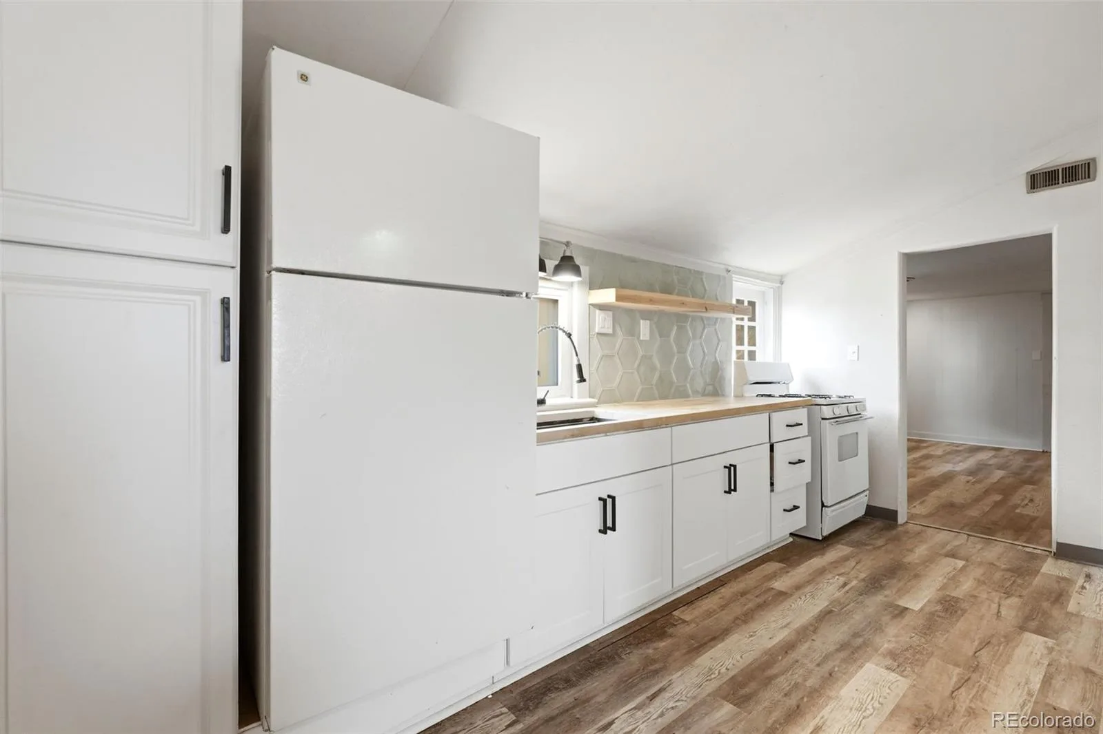 1580 Dallas Street Aurora CO 80010 | MLS #REC8006518 08062026140918 1600 35