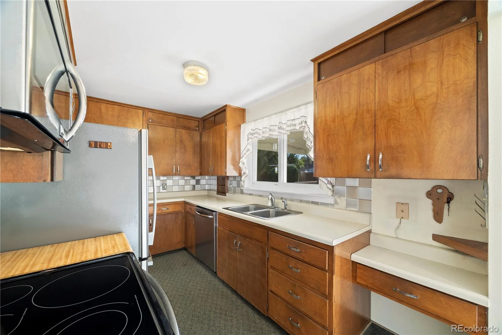 1043 Geneva Street Aurora CO 80010 | MLS #REC8037881 10072026185027 1600 10