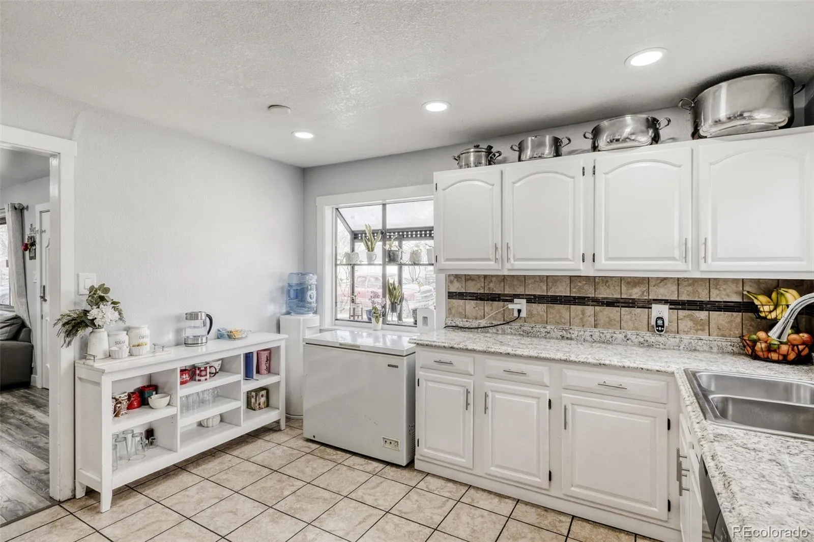 970 Nile Street Aurora CO 80010 MLS #REC8114661 04112026192136 1600 12