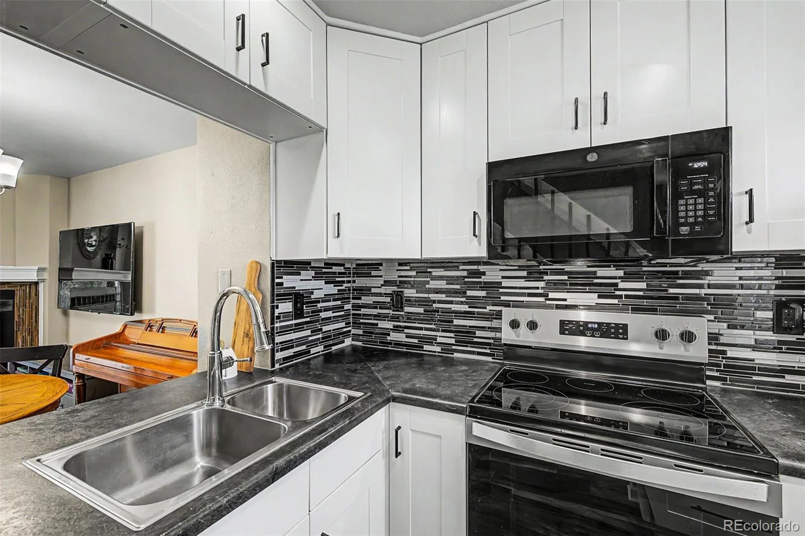 8198 S Columbine Court Centennial CO 80122 | MLS #REC8185413 08282026170609 1600 6