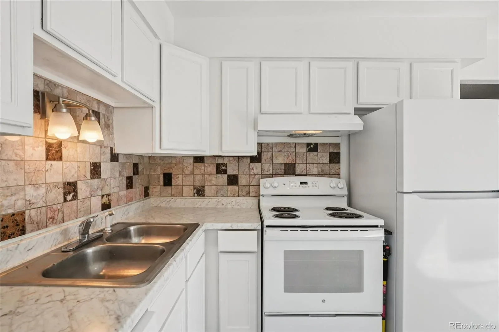 2105 Coronado N Parkway #D Denver CO 80229 | MLS #REC8241095 03282026043733 1600 14