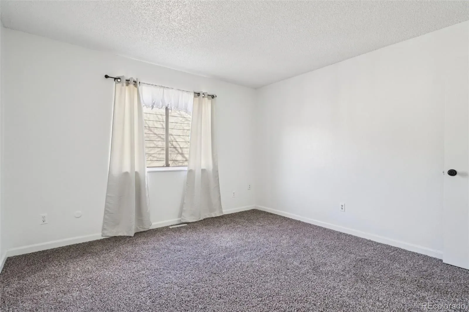 2105 Coronado N Parkway #D Denver CO 80229 | MLS #REC8241095 03282026043733 1600 18