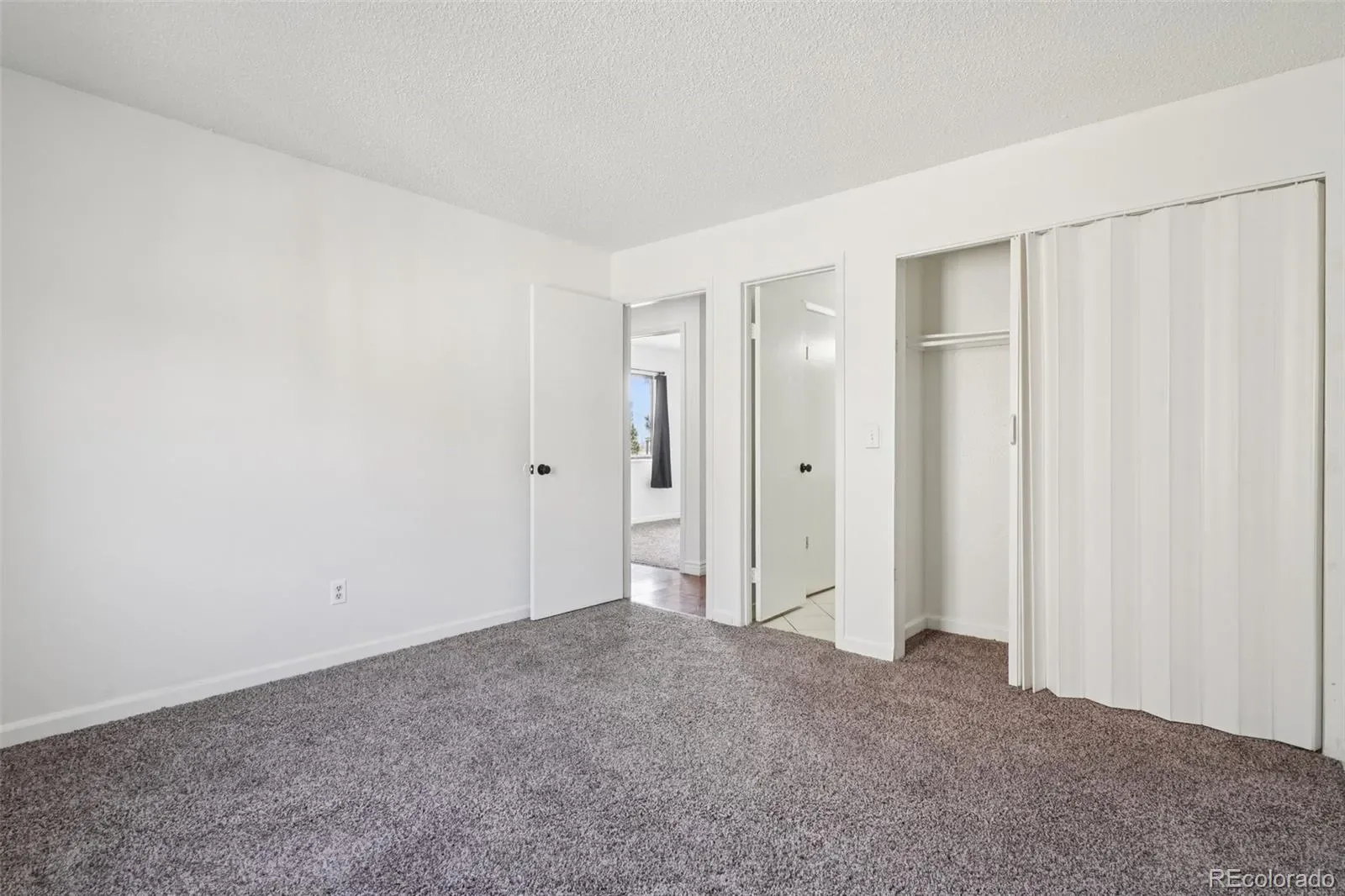 2105 Coronado N Parkway #D Denver CO 80229 | MLS #REC8241095 03282026043733 1600 19