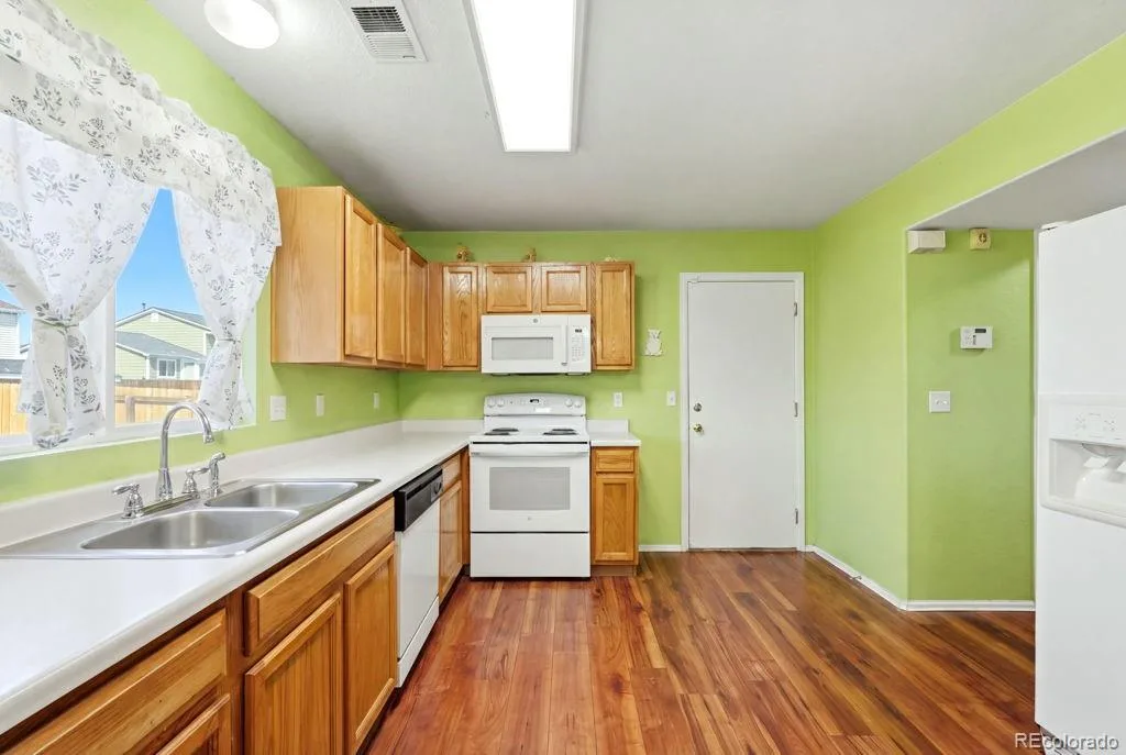 15633 E 51st Place Denver CO 80239 | MLS #REC8245494 08192026160833 1024 10