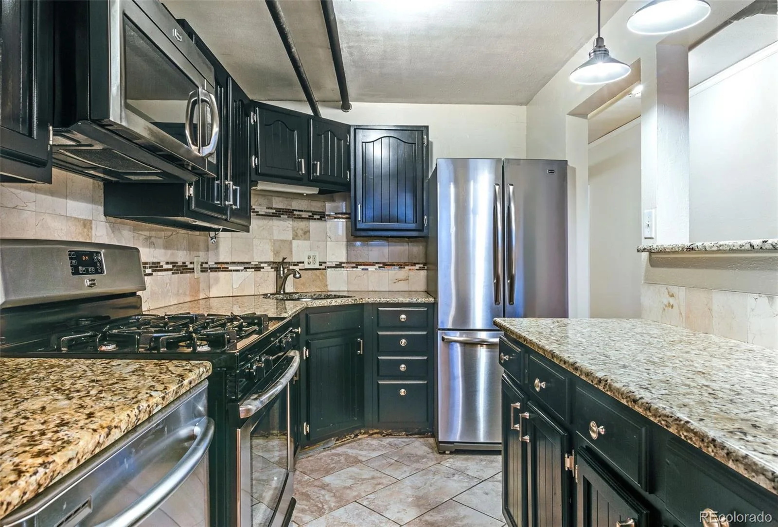 963 N Logan Street #23 Denver CO 80203 MLS #REC8278557 05302026000345 1600 2