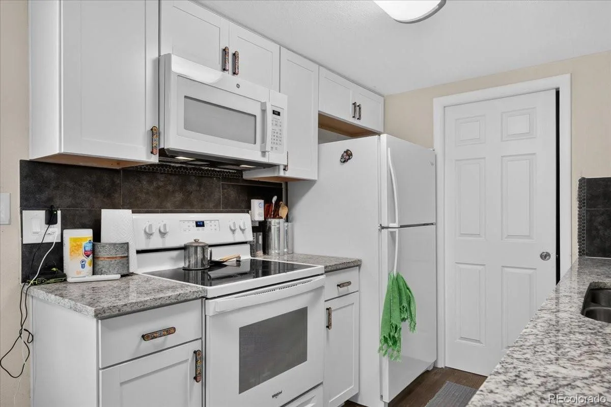 2011 S Helena Street #D Aurora CO 80013 | MLS #REC8414117 09212026191143 1200 13