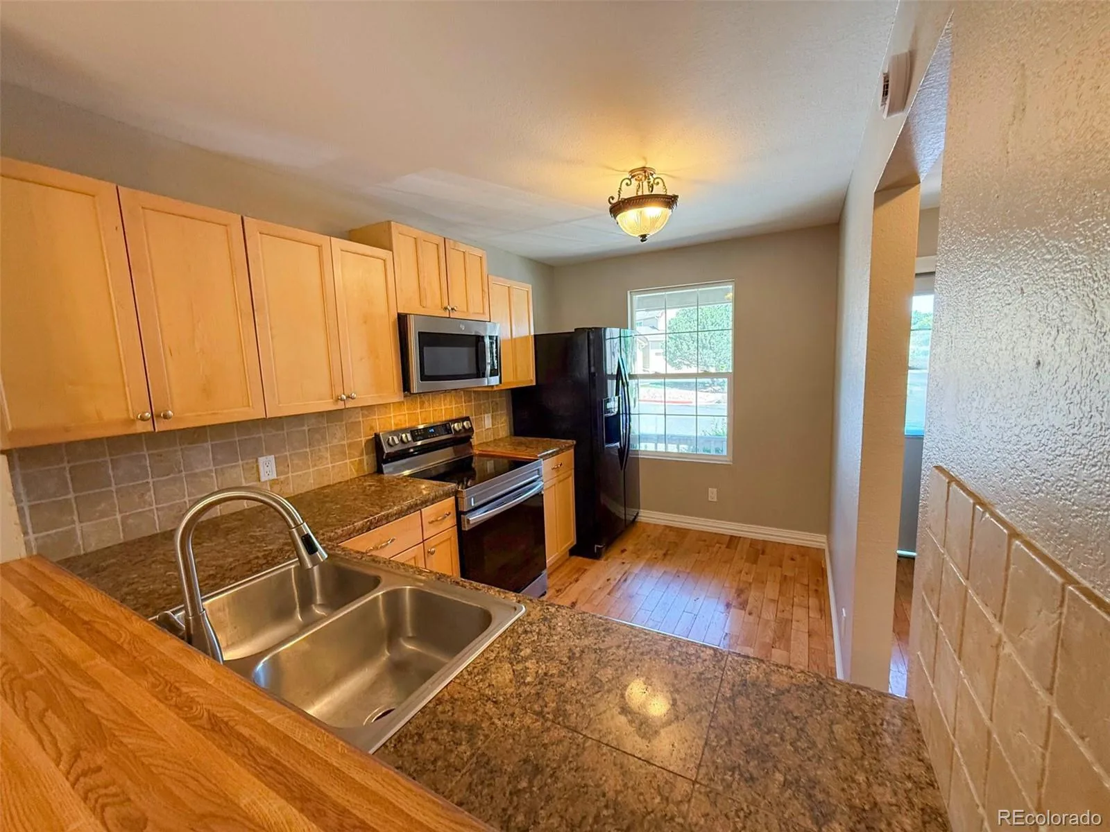 10577 W Maplewood Drive #B Littleton CO 80127 | MLS #REC8439525 08042026002952 1600 2
