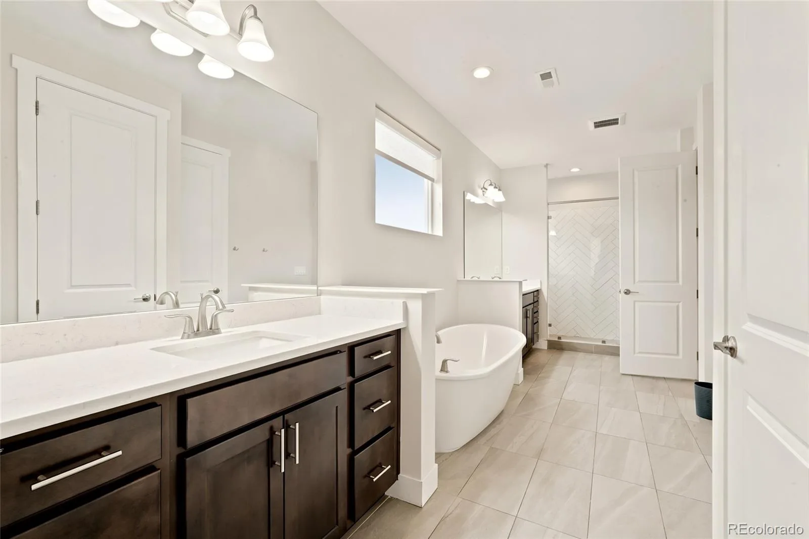8753 Dunraven Street Arvada CO 80007 MLS #REC8451598 07072026200120 1600 30