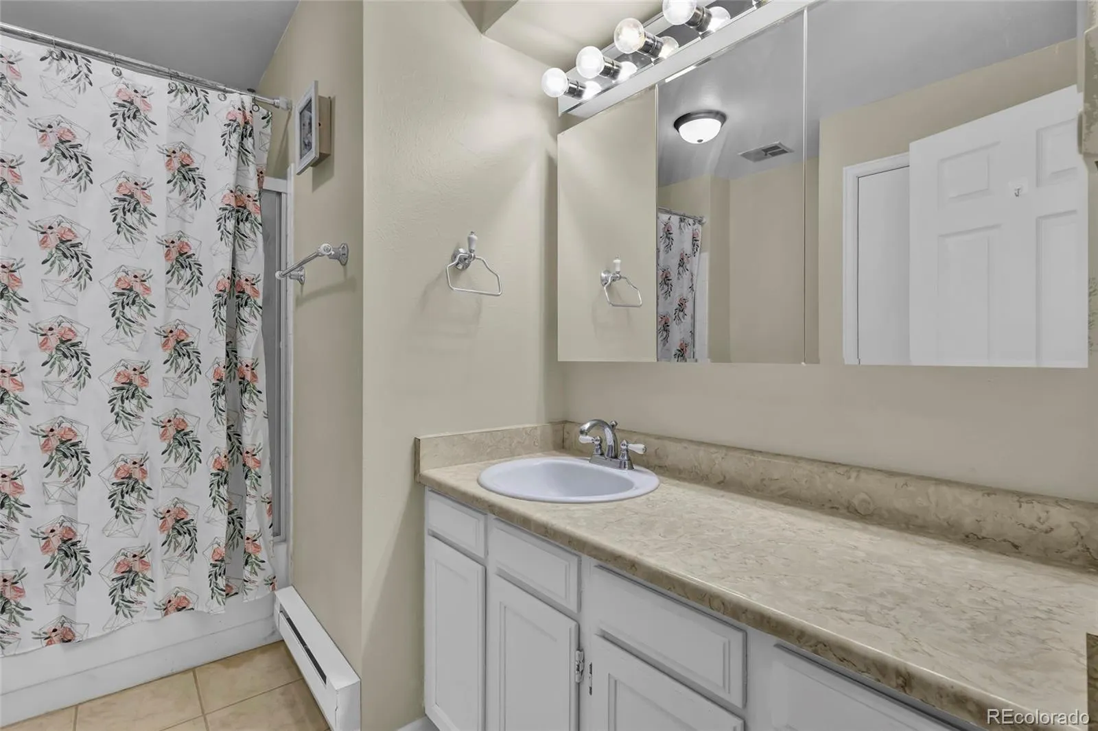 14702 E Evans Avenue Aurora CO 80014 MLS #REC8455030 04302026183213 1600 15