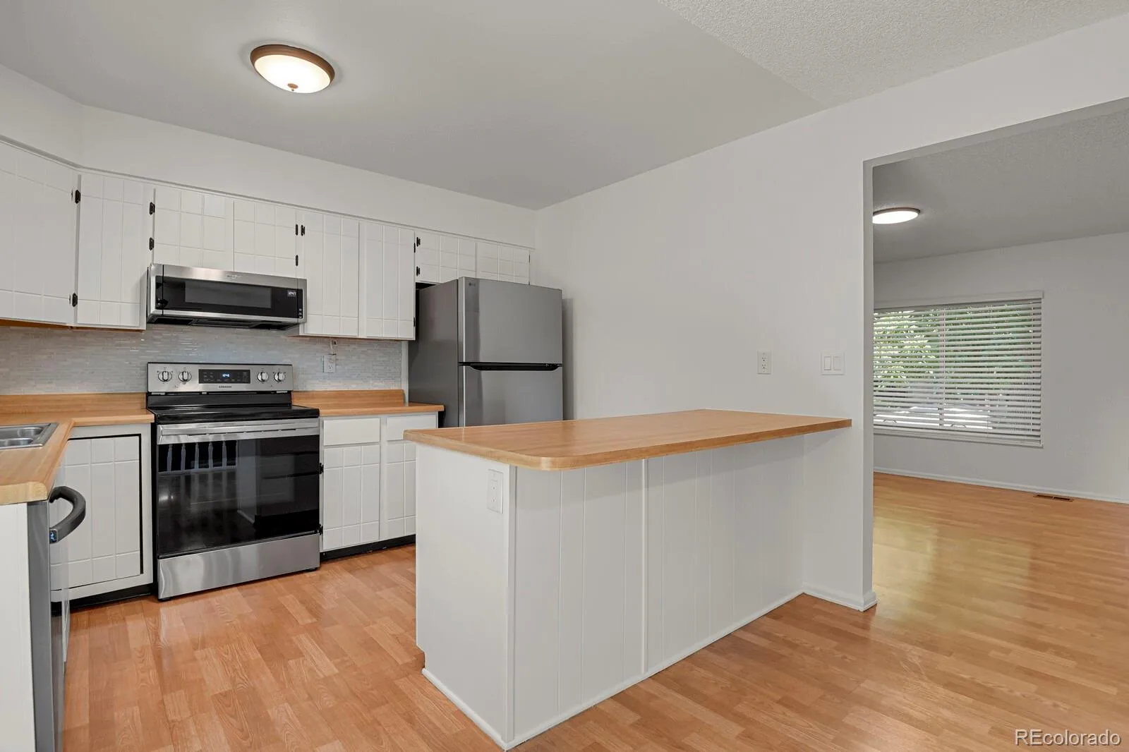 8962 W Temple Place Denver CO 80123 | MLS #REC8500794 08302026010352 1600 7