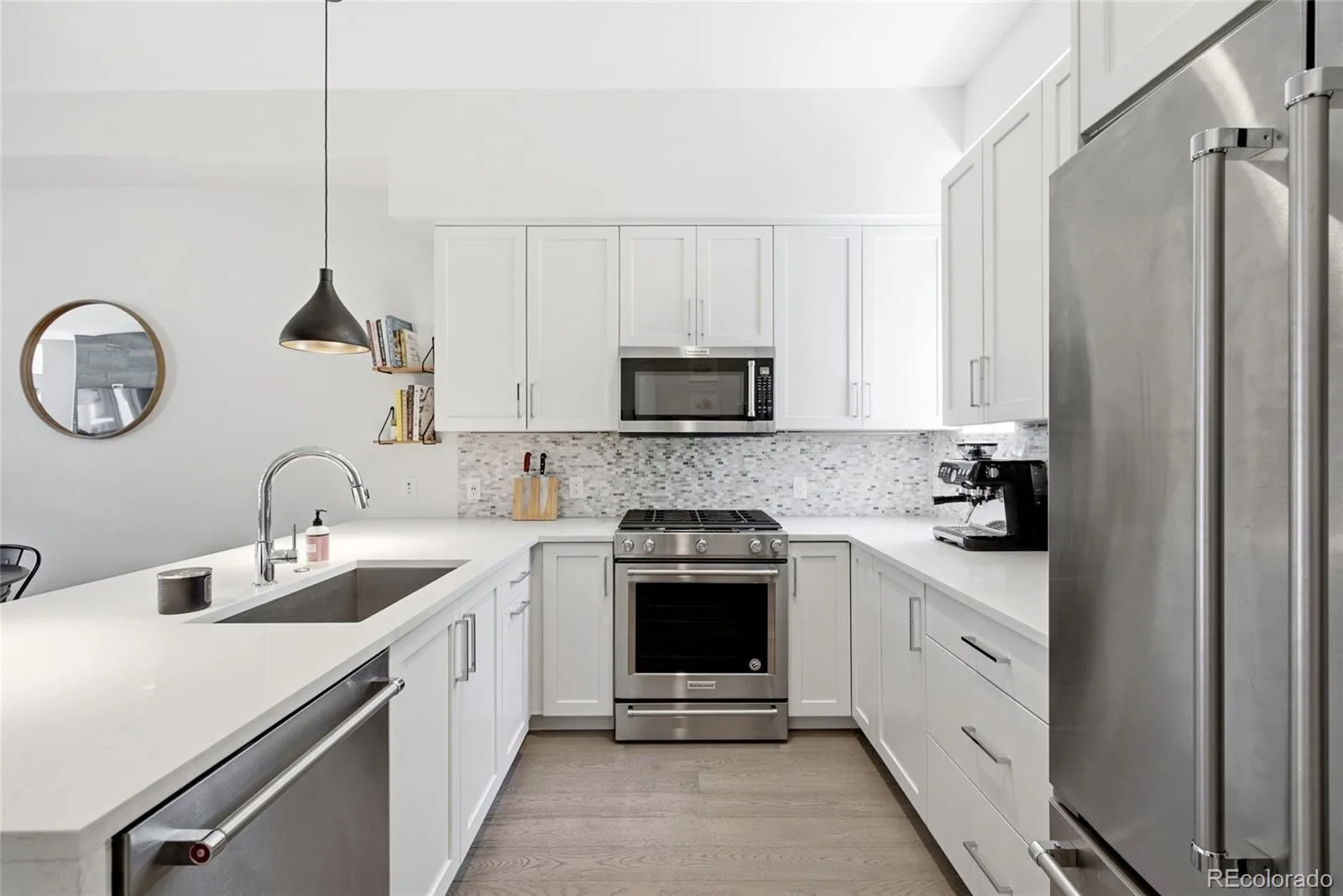 4055 W Conejos Place Denver CO 80204 | MLS #REC8697584 07312026163134 1600 17