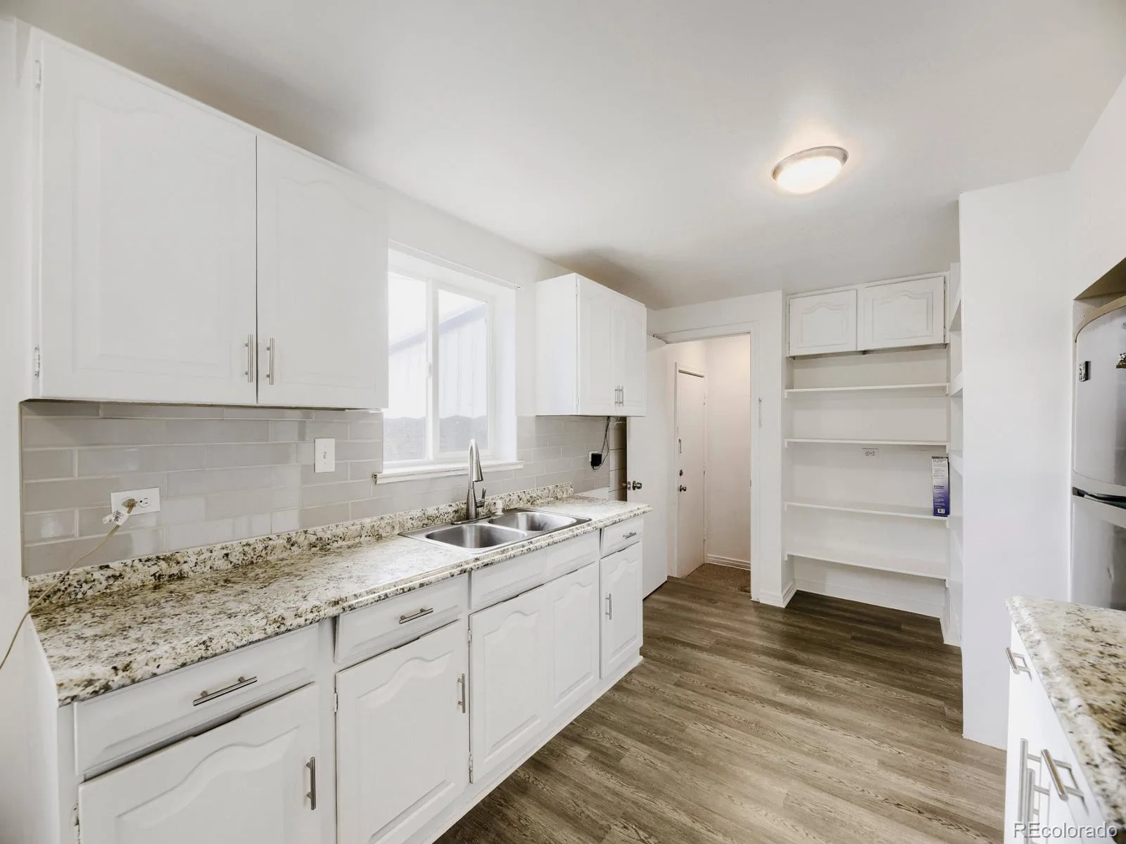 2551 W Arkansas Avenue Denver CO 80219 | MLS #REC8704170 08202026220031 1600 22