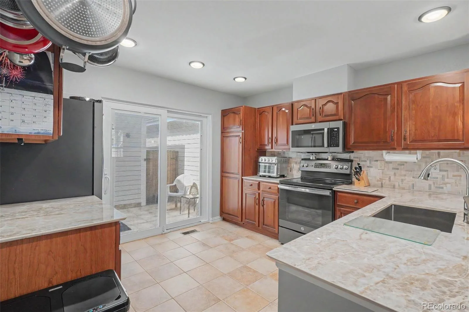 5155 W Quincy Avenue #L104 Denver CO 80236 | MLS #REC8706379 07092026040259 1600 12