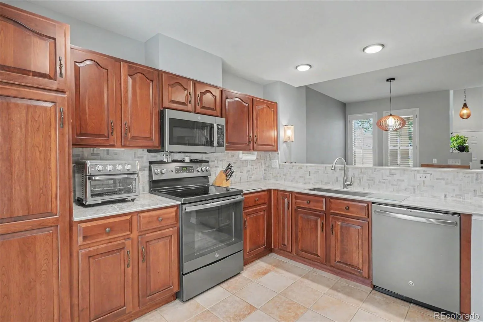 5155 W Quincy Avenue #L104 Denver CO 80236 | MLS #REC8706379 07092026040259 1600 9