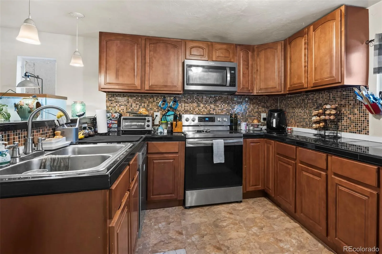 6781 Hooker Street Denver CO 80221 | MLS #REC8736542 06132026142205 1600 23