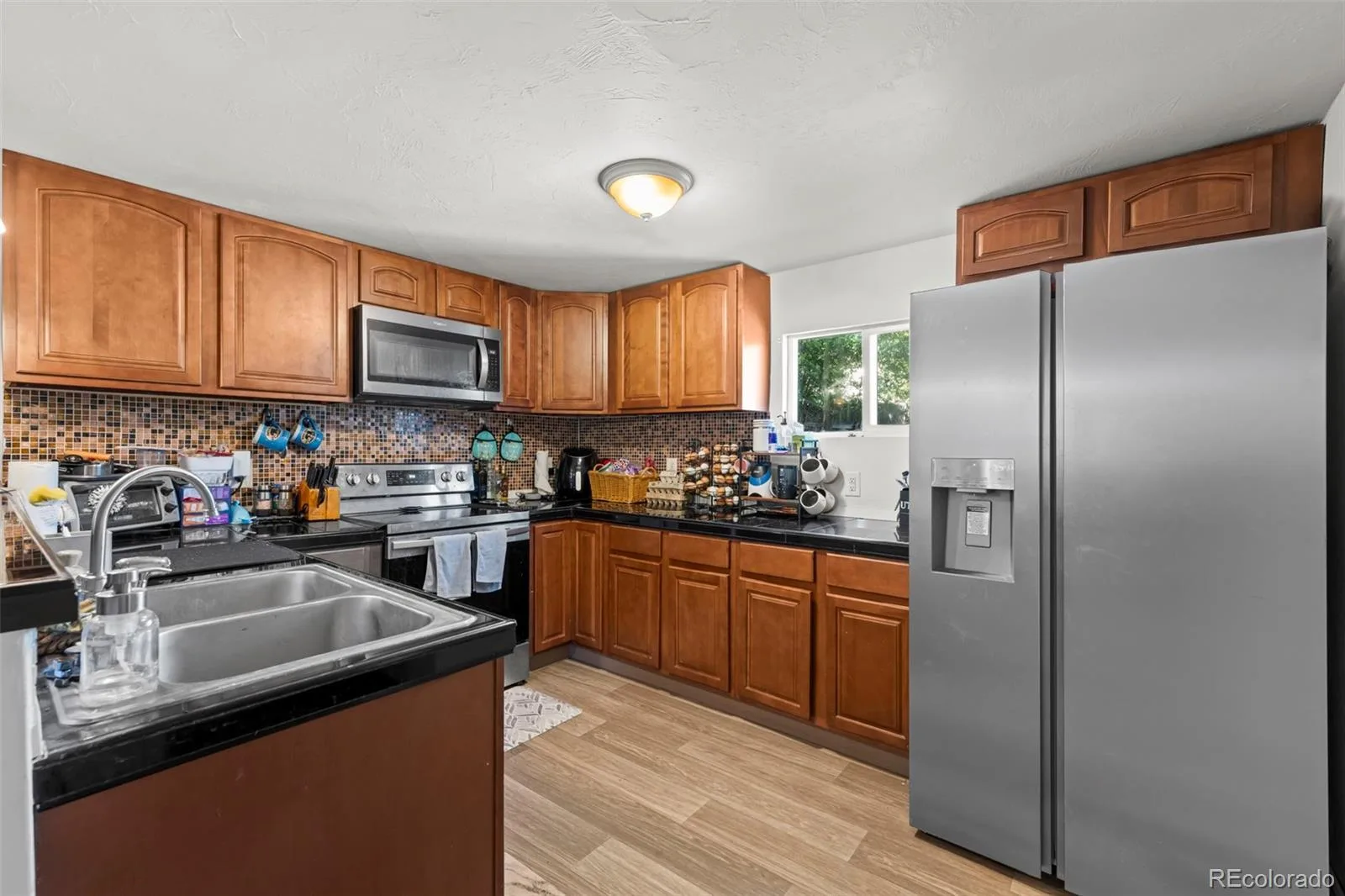 6781 Hooker Street Denver CO 80221 | MLS #REC8736542 06132026142205 1600 9