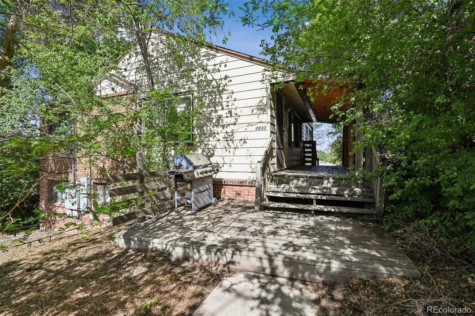 3831 S Knox Court Denver CO 80236 | MLS #REC8764415 07232026214059 1600 12