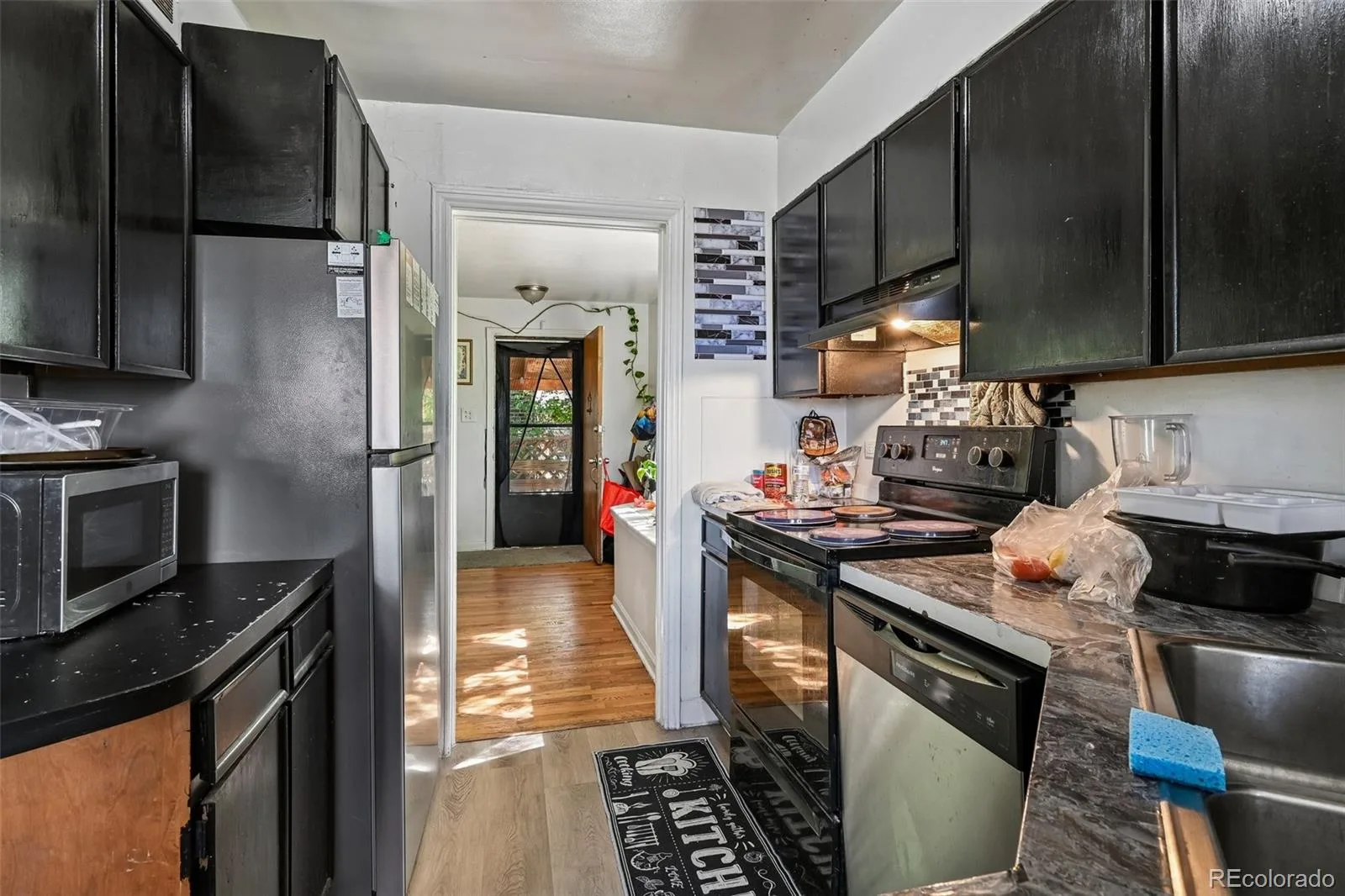 3831 S Knox Court Denver CO 80236 | MLS #REC8764415 07232026214059 1600 5